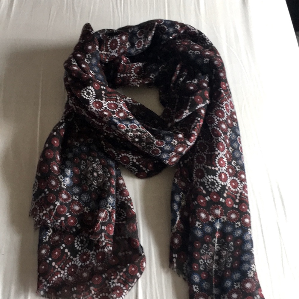 Black, blue, and red patterned scarf